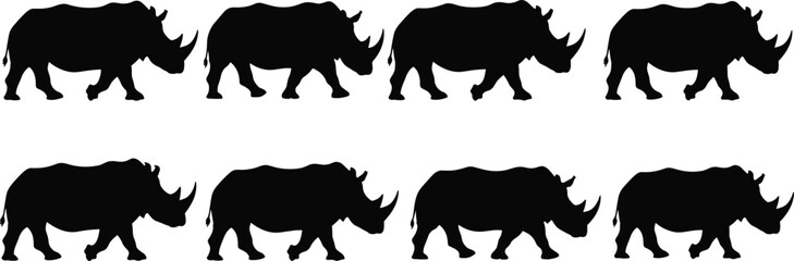 Rhinoceros silhouette set, wild rhino walking poses isolated on white background for wildlife safari design collection © Afsun
