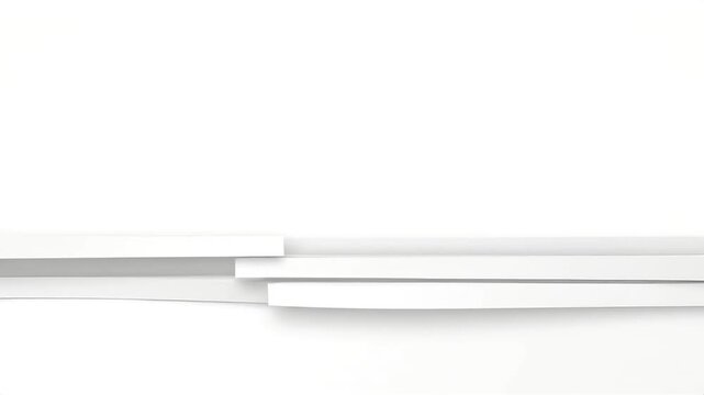 A stack of white papers lies flat on a white surface, captured from a slightly elevated viewpoint