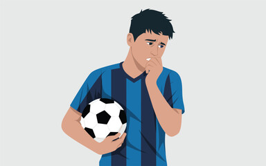 A young man holding a soccer ball and covering his mouth in a sports setting