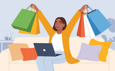 Woman sitting on couch with laptop and shopping bags, celebrating online shopping success