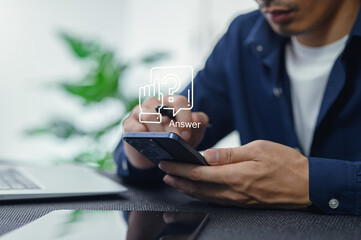 Man Using Smartphone to Access Information with Question Mark Graphic