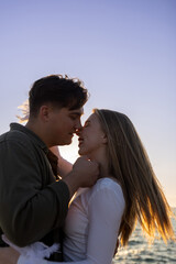 Fototapeta premium mature caucasian couple on a date. Lake Michigan beach with Chicago landmark view