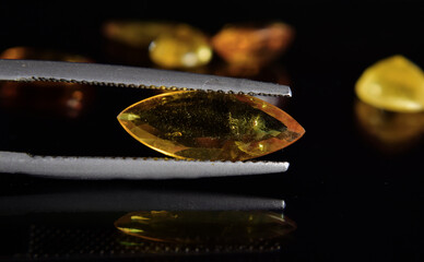 Expensive gemstones, carefully selected for jewelry making.