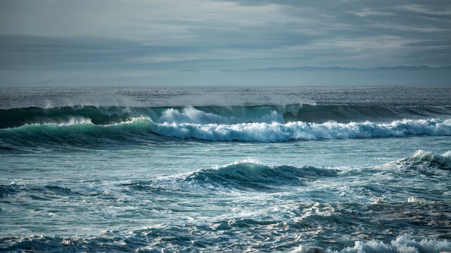 waves breaking on the beach