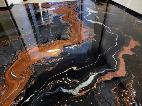 Stunning Epoxy Floor with Metallic Swirls and Black Base