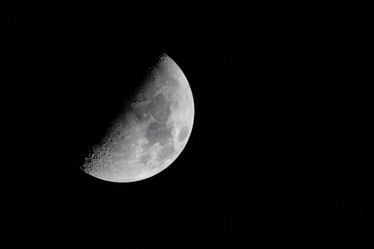 Half Moon Background. The Moon is an astronomical body that orbits planet Earth, being Earth's only permanent natural satellite