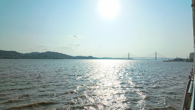POV Of A Sailing Ship On The Sea Overlooking The Zhanjiang Bay Bridge In Zhanjiang, Guangdong, China.