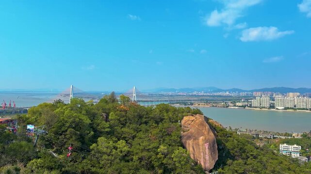 Zhanjiang Bay Bridge And Coastal City Of Zhanjiang In Guangdong Province, China. Wide Shot