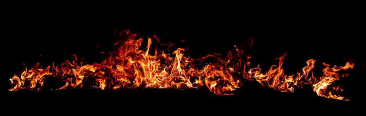 Fototapeta premium Flame glowing texture background. Flame sparks and fiery light. Flame abstract burning effect. Flame on black backdrop.