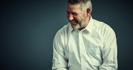 Obraz premium Smile, business man and thinking in studio for company vision, corporate management or pride. CEO, mature person and happy on gray background for growth opportunity, career experience or mockup space