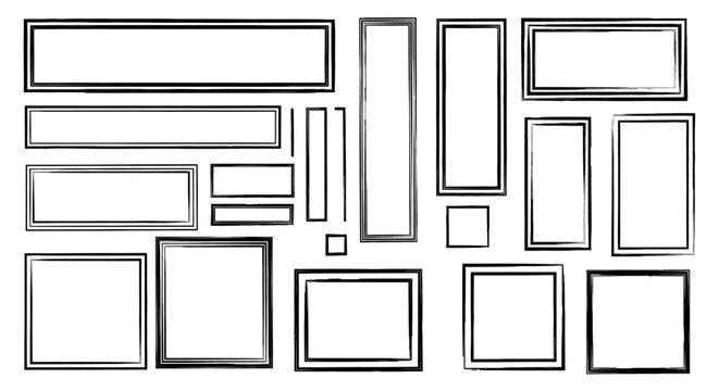 A collection of various empty picture frames of different shapes and sizes, arranged in a scattered pattern.