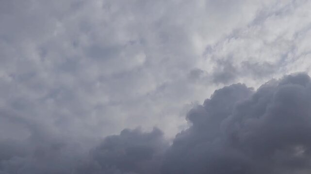 Moody overcast sky filled with dense storm clouds, creating a dramatic atmosphere that suggests approaching rain, unstable weather, and natural tension.