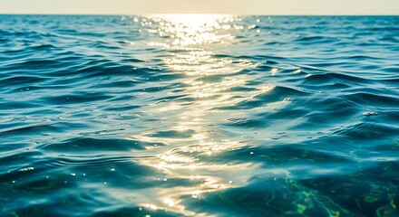 Sunlight dancing on the surface of a tranquil ocean.
