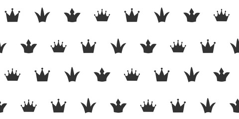 Fototapeta premium Seamless crown pattern with black silhouettes. Royal crowns repeat texture. Flat minimal vector. Perfect for wallpaper, fabric, gift wrap, kids decor, packaging