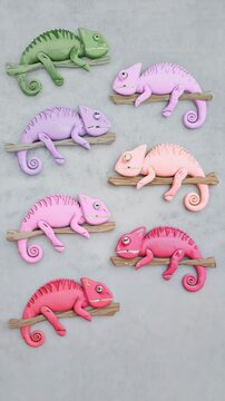 Loopable line of minimalist chameleons color cycling in unison on gray background. Hypnotic calming design tool tutorial, commercial.