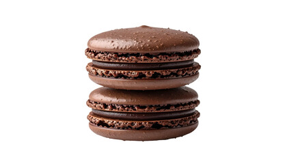 Two stacked chocolate-colored macarons with a creamy filling, isolated on black