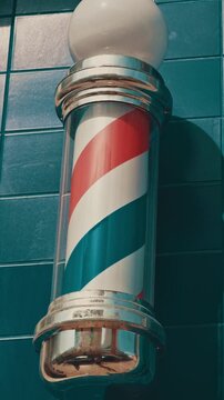 Barbershop sign on the street wall