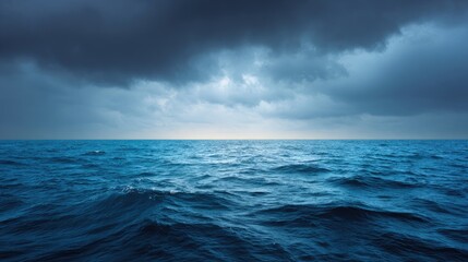 Fototapeta premium Dramatic Ocean Scene with Cloudy Sky Over Calm Waters at Dusk Showcasing Nature's Beauty and Tranquility in a Serene Coastal Landscape