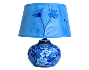 Blue lamp with floral designs on base and shade, isolated on black