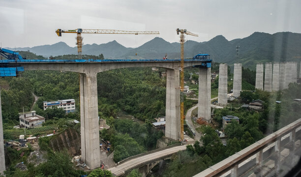 A complex high-speed elevated railway line under construction, designed to allow trains to travel at speeds of around 350 kilometers per hour