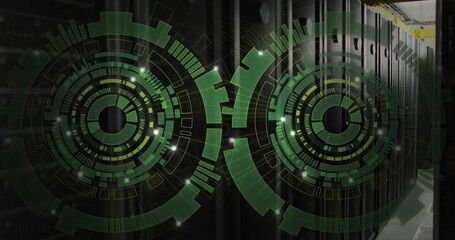 Overlaying green HUD circular graphics over central data center aisle, showing racks and LEDs © vectorfusionart