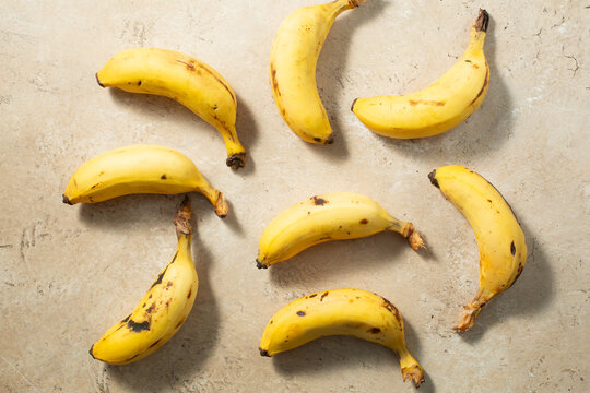 A top down view of separated manzano banana fingers.