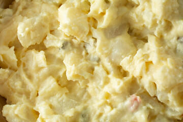 A top down view of potato salad, as a background. © DAVID