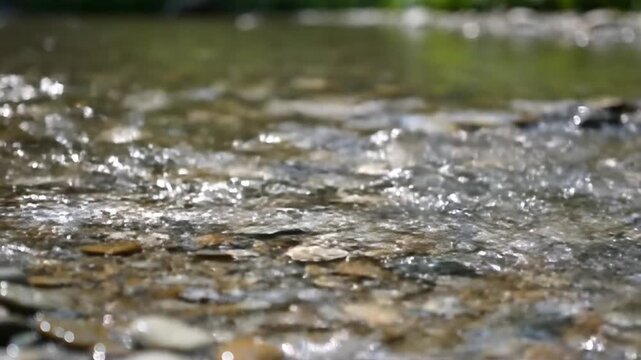 Clear water flowing over rocks. 4k