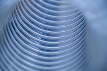 abstract background of blue waves, inside view on pur flexi pipes