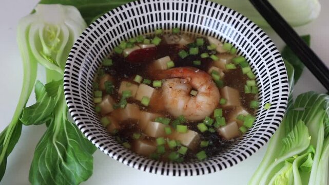 Japanese miso soup, rotating, top view