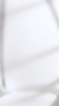 Silky Whipped Egg Whites In Motion. Bright Kitchen Captures Glossy Meringue Formation In Detail