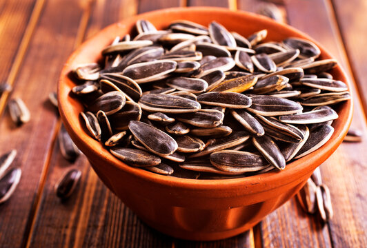 Gray sunflower seeds. Top view. Background, texture