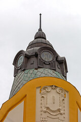 Black Roof Dome With Lightning Rod Spire at Top of Building