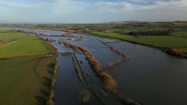 Aerial view of flooded Malton Bypass A64 fields in North Yorkshire countryside, scenic landscape, peaceful vibe