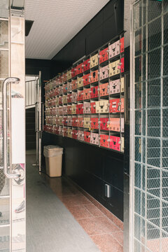 Entrance hallway with colorful mailboxes in Osaka Japan