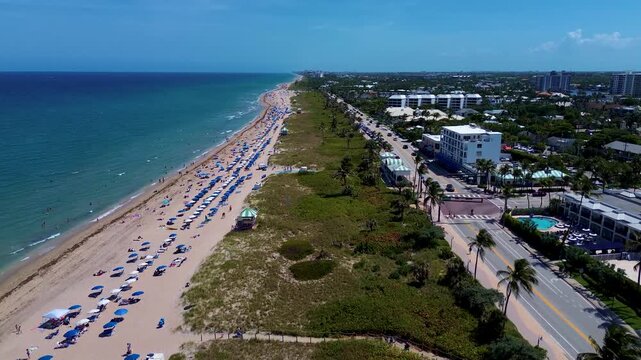 Flying over crowed Delray Beach, Florida near Atlantic Ave.