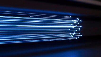 Dynamic blue light trails and glowing dots on a dark background, symbolizing high-speed data, fiber optics, and digital technology.