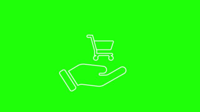 Hand Holding Shopping Cart Icon on Green Background Online Shopping Ecommerce Concept