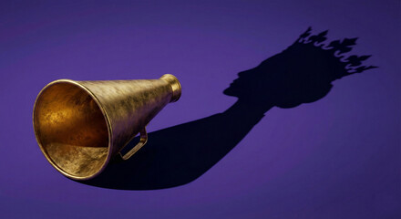 Golden megaphone casting a shadow of a queen with crown