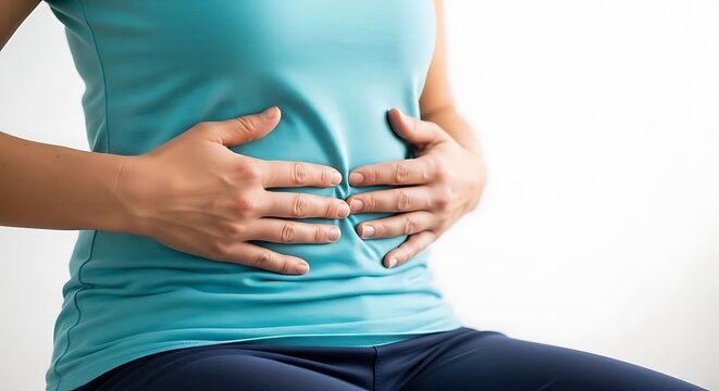 Woman holding stomach in pain