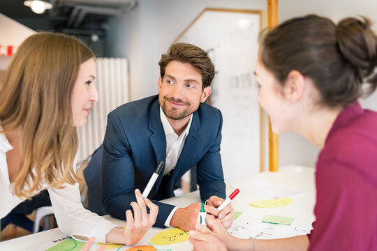 Business people working together at a workshop