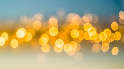 Glowing golden yellow bokeh lights create a festive dreamy mood against a soft gradient background from calm sky blue to a warm amber hue