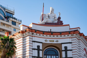 Queen Teuta statue on a historic building in Durr&euml;s.
Cultural heritage and cityscape concept. Copy space.