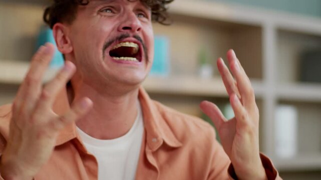 Crying suffering Caucasian business man cry holding head tearing hair suffer problem in office depressed guy male businessman panic attack employer company owner despair with unemployment lost job