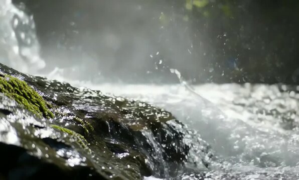Serene Waterfall Flowing Over Rocks - Relaxing Nature Videos for Tranquility