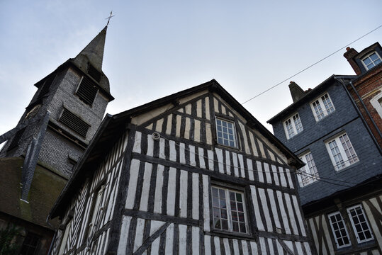 Historic Half-Timbered Buildings and Old Church in the City Center of Honfleur, Normandy, France