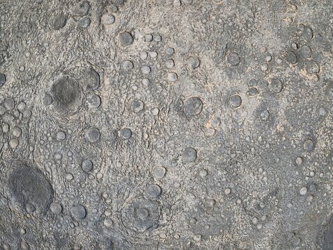 Lunar surface with impact features, Detailed view of lunar landscape with basins and regolith