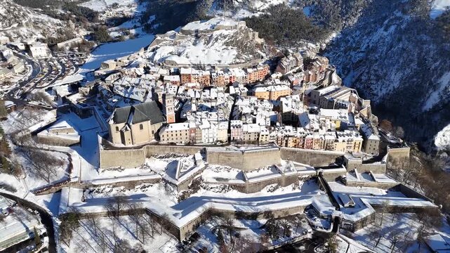 Aerial view of the snow-dusted old town of Briancon, a fortified medieval city nestled in the French Alps, Briancon, Provence-Alpes-Cote d'Azur, France.