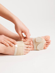 Pads to support the foot on women's legs.