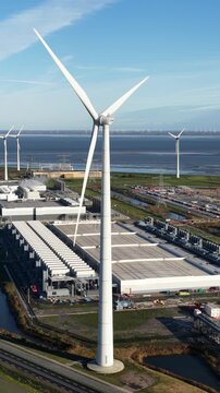 Aerial vertical drone view of a new hyperscale data center in Eemshaven, Netherlands, showcasing big data infrastructure, cloud computing, and renewable energy integration.